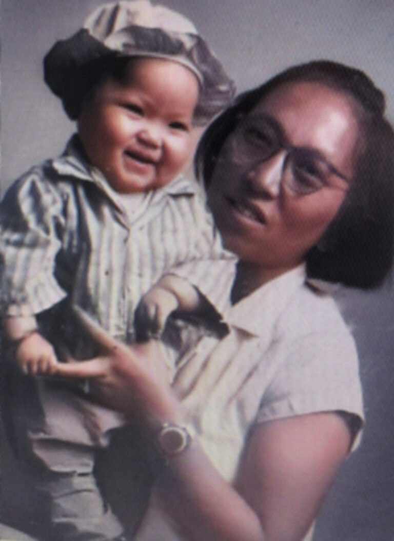 Baby Sophia laughing in her mother's arms