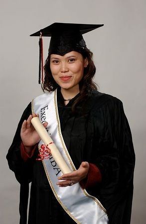 Sophia at her graduation in cap and gown